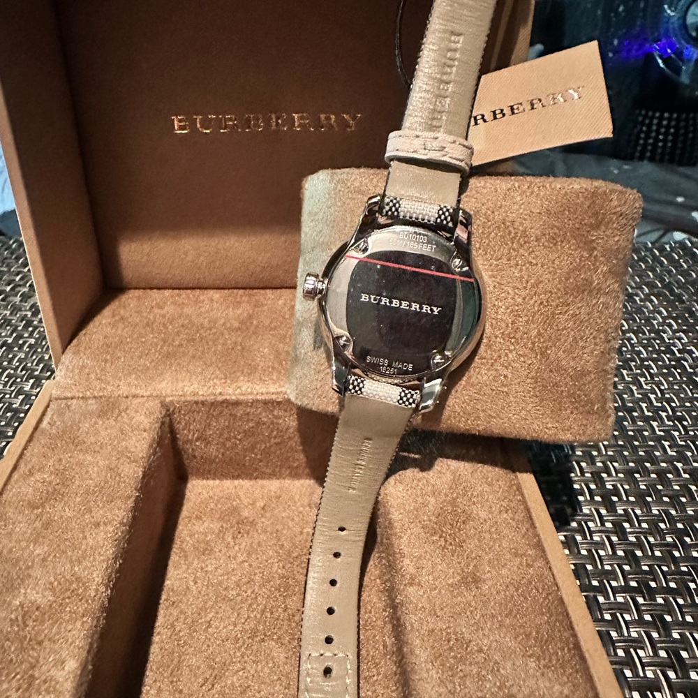 NWT BURBERRY LADY’S WATCH in black, red,light tan,cream and white. Round face. - Picture 6 of 13